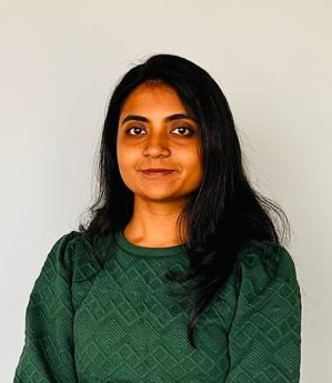 Smiling profile photo with a clear outline.